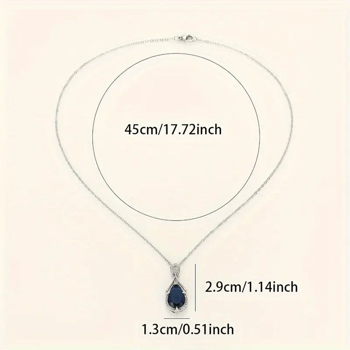 Sapphire Blue Teardrop Embrace Pendant Necklace