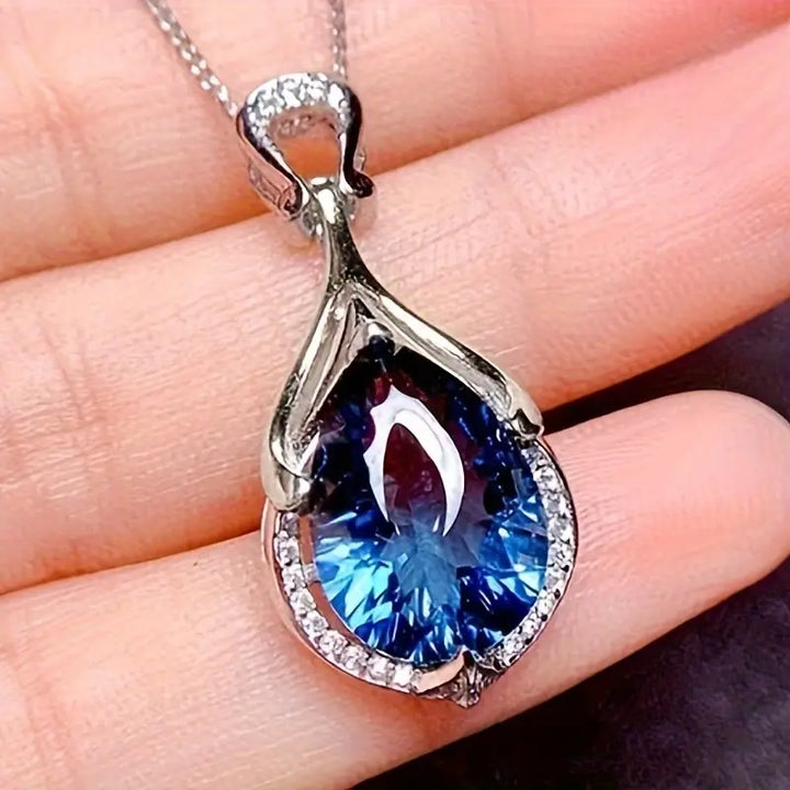 Sapphire Blue Teardrop Embrace Pendant Necklace