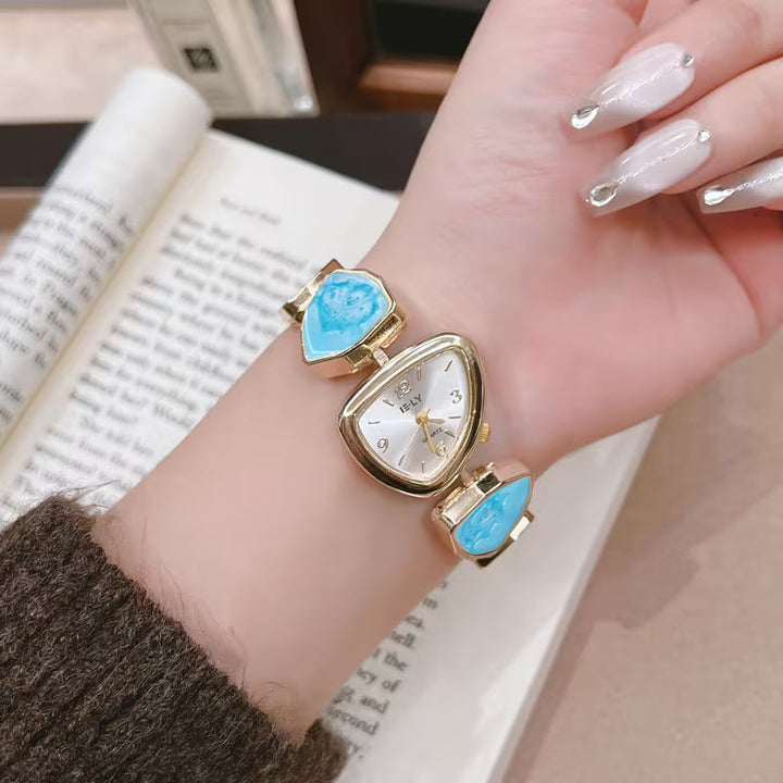 Gold-Armbanduhr mit Türkisstein