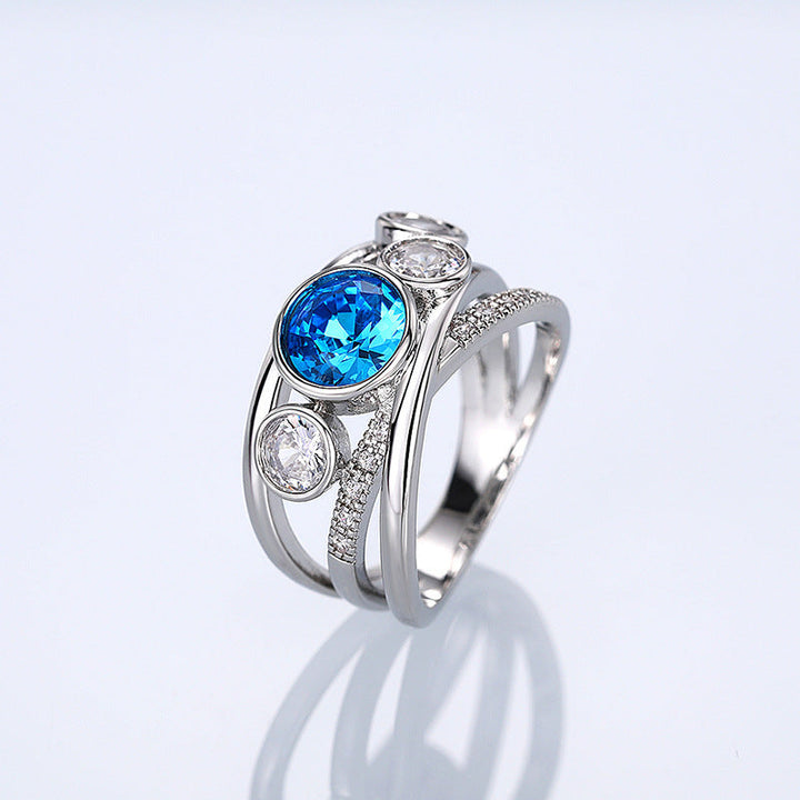 Blue Topaz Statement Ring with Split Band and Pavé Accents