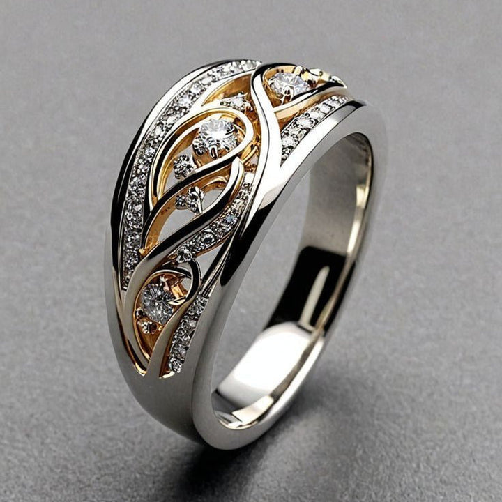 Durchbrochener Ring in Gold und Silber