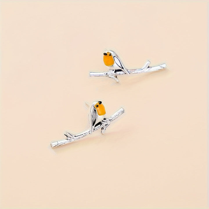 Ohrringe mit Vogel-Motiv