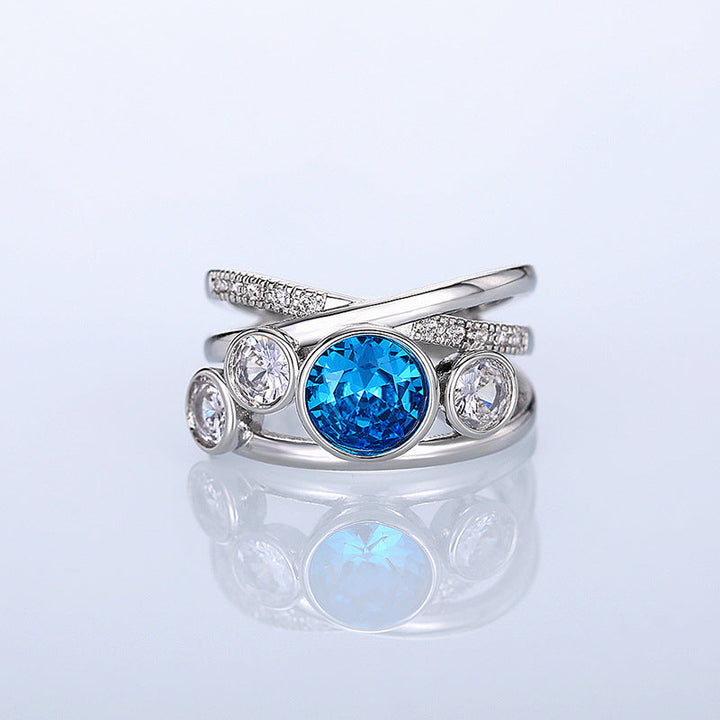 Blue Topaz Statement Ring with Split Band and Pavé Accents