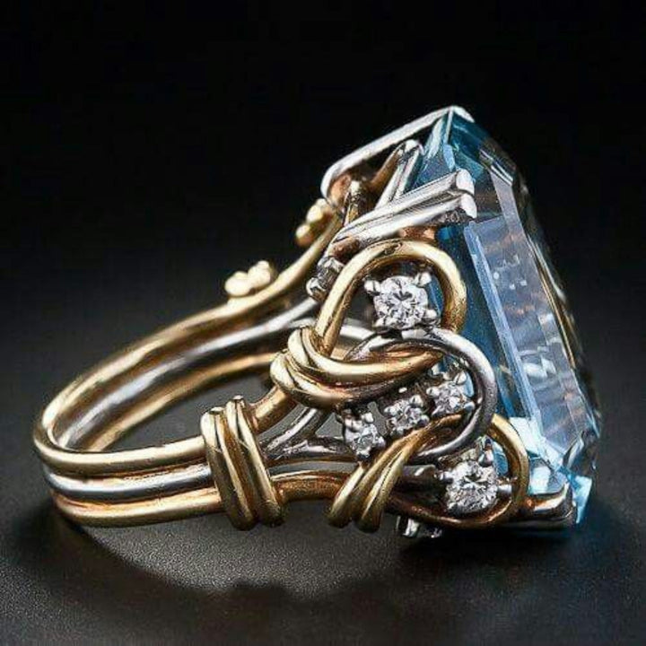 Vintage Goldring mit blauem Zirkonia mehrreihig