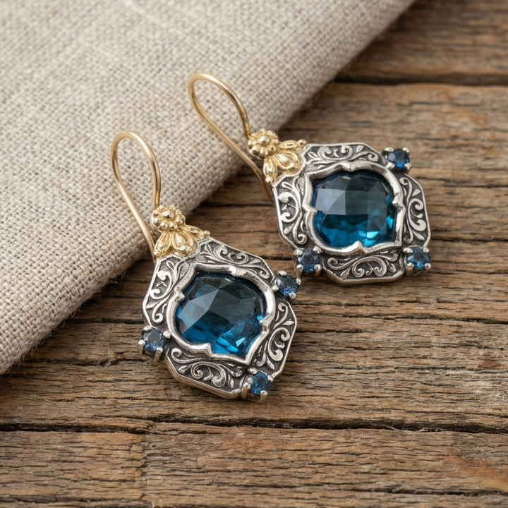 Vintage Ohrringe mit blauem Kristall in Gold und Silber