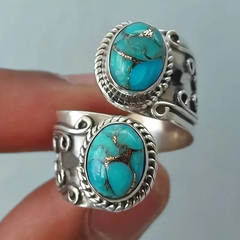 Eleganter Vintage Ring mit Türkis im Kreuzband