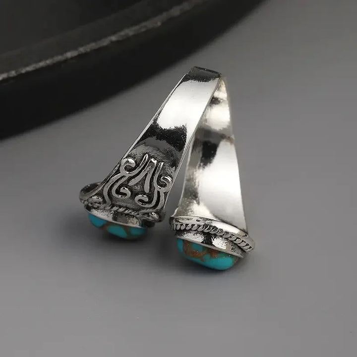 Eleganter Vintage Ring mit Türkis im Kreuzband