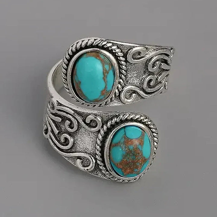 Eleganter Vintage Ring mit Türkis im Kreuzband