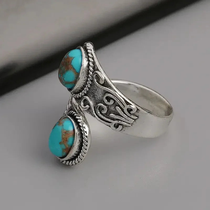 Eleganter Vintage Ring mit Türkis im Kreuzband