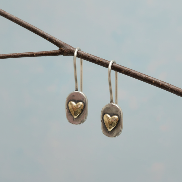 Vintage Ohrringe mit goldenem Herz in Silber