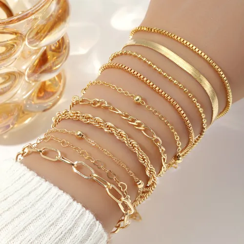 Stapelbares goldenes Perlen-Armband-Set