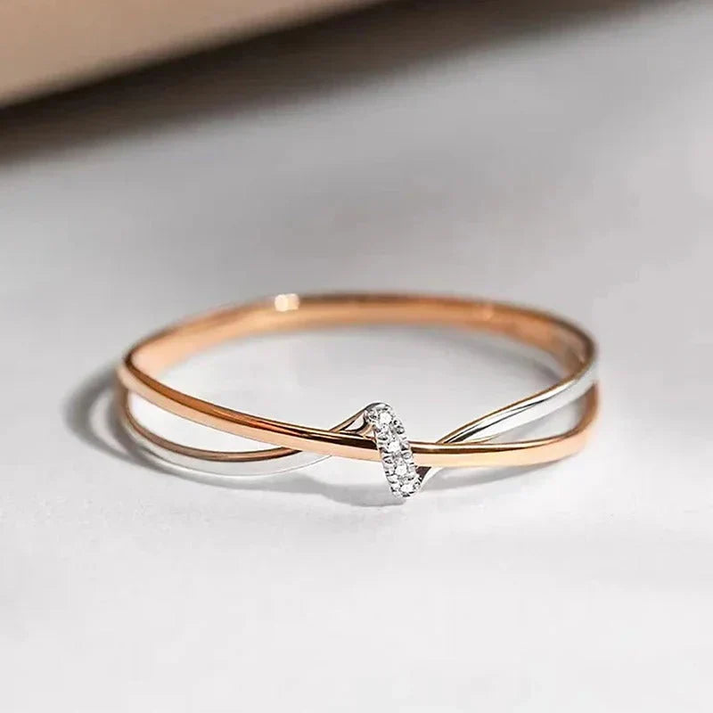 Criss-Cross-Ring in Roségold und Silber